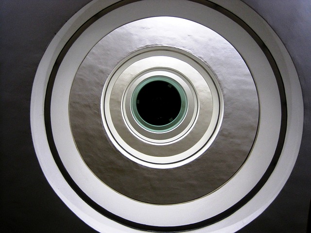 compliant marketing experts represented as a circular design of architectural feature bringing the symbolic to the physical