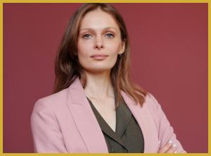 erica has a professional headshot from her last job she said just use that its of a woman looking very professional in a blazer